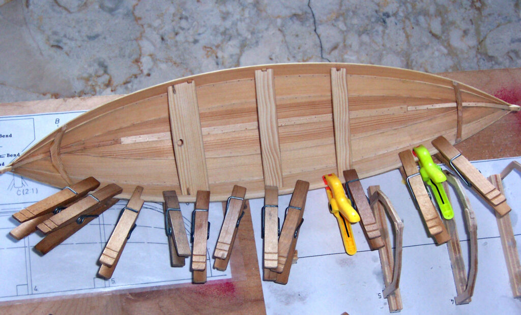 Model of a Norwegian færing (four-oared boat) - Under construction, clamping on the gunwale