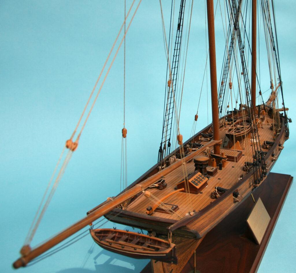 Model of schooner Fly - view along deck from starboard quarter