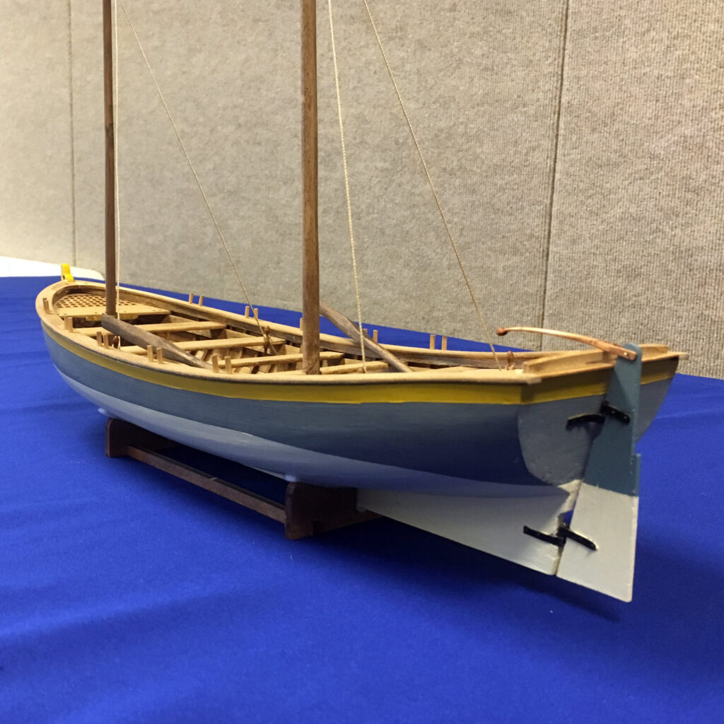 Model of HMS Bounty's Launch - Low-angle view, port quarter