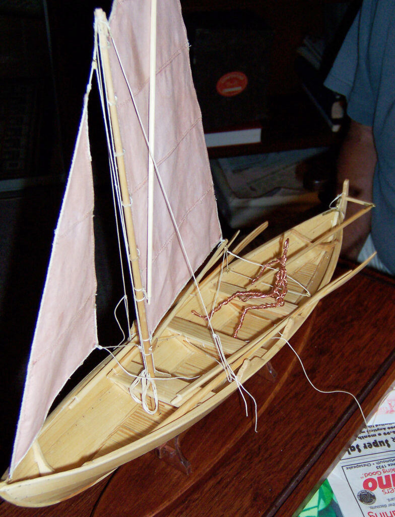 Model of a Norwegian færing (four-oared boat) - Under construction, rigging underway and figure frame in place for positioning