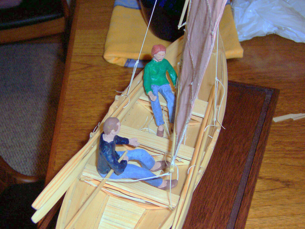 Model of a Norwegian færing (four-oared boat) - Focus on sculpted figures