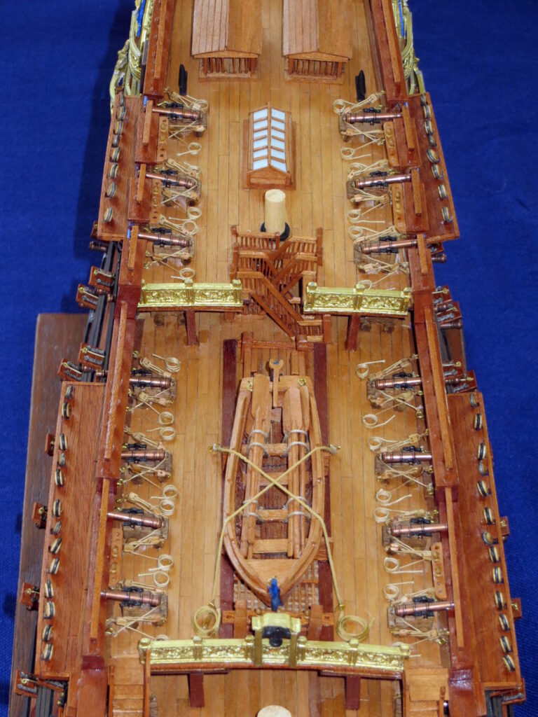 Model of French ship Royal Loius - ship's boat and main deck guns