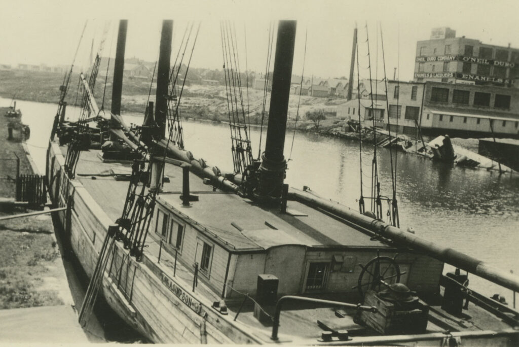 Great Lakes schooner Lucia A. Simpson - at quay, likely Milwaukee, O'Neil Duro Company in background